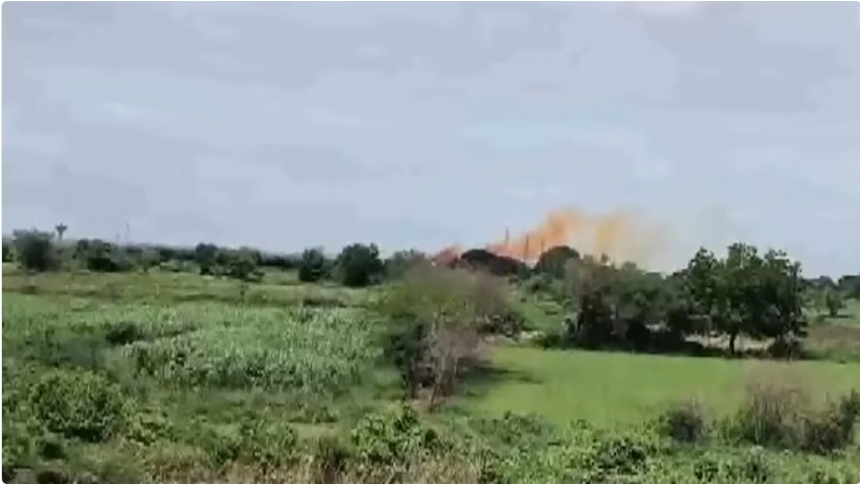 Orange-coloured smoke hovers above the PI Industries in Gujarat's Bharuch district following a gas leak.